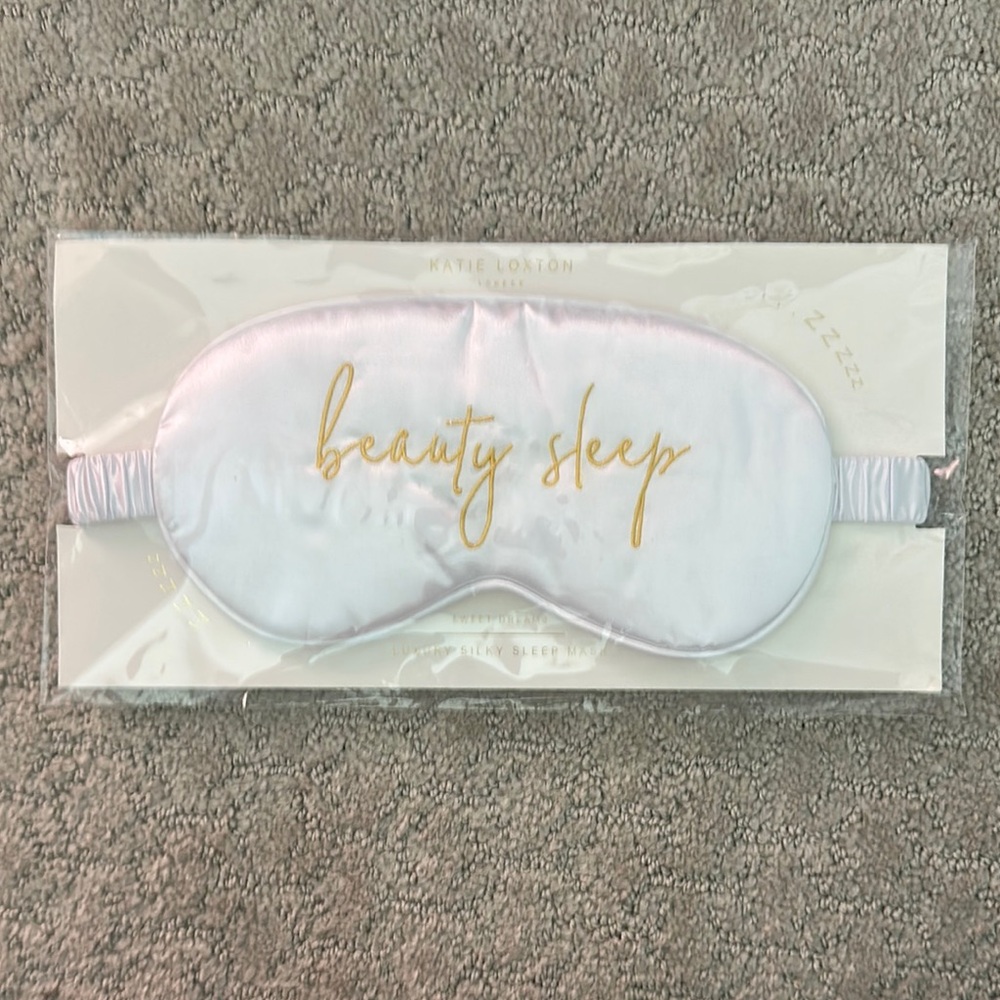 White and Gold Face Mask with Elegant Design